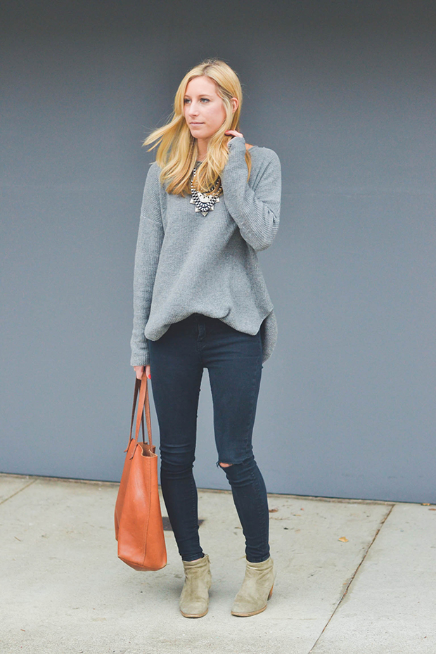 black skinny jeans and gray sweater