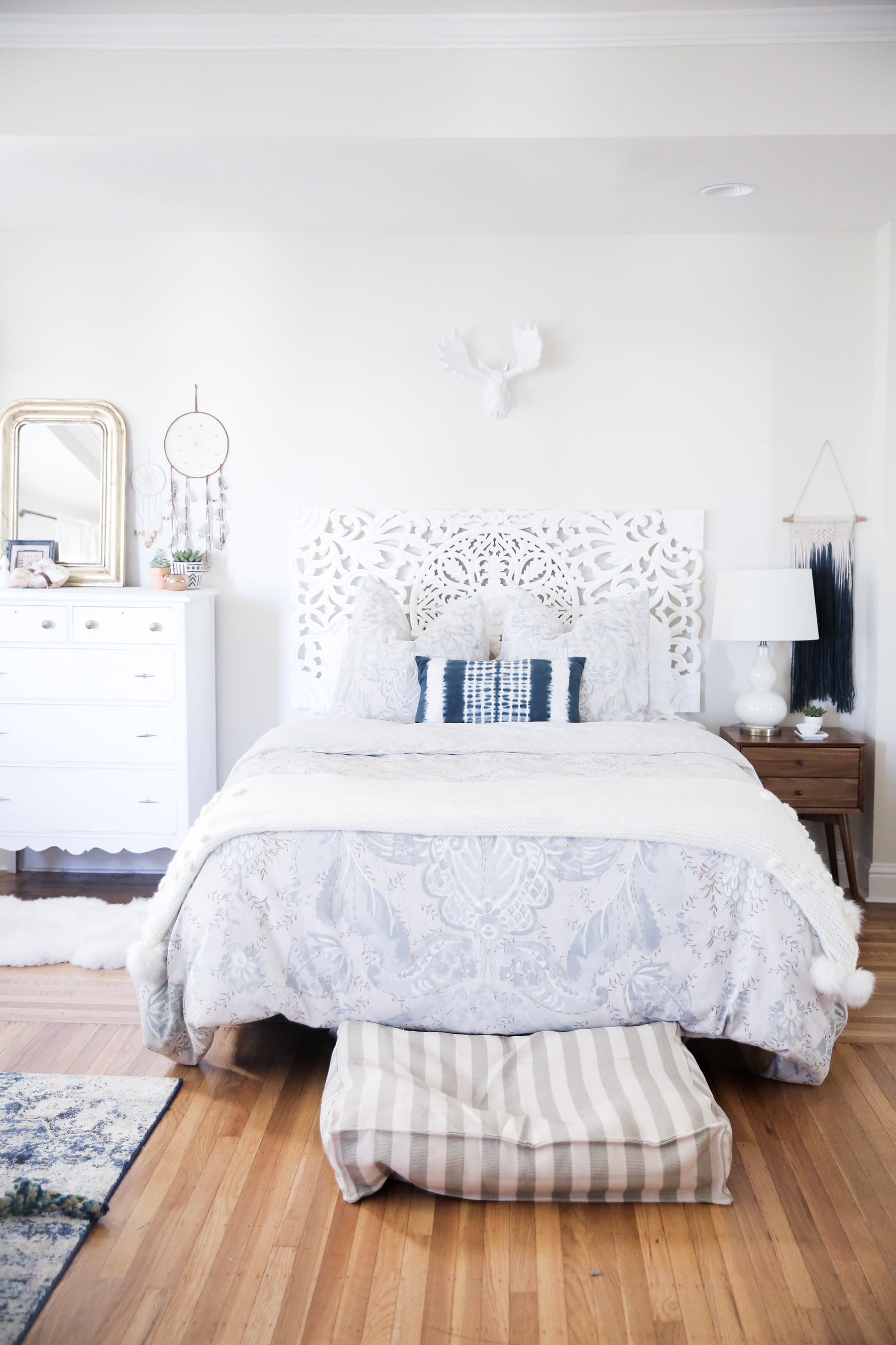 top 10 popular posts of 2015 from Advicefroma20Something.com, all white bedroom, white and blue bedroom, urban outfitters home decor, anthropologie home decor, white headboard, stylish dog bed, anthropologie bedding, boho decor, bright bedroom ideas, decor ideas