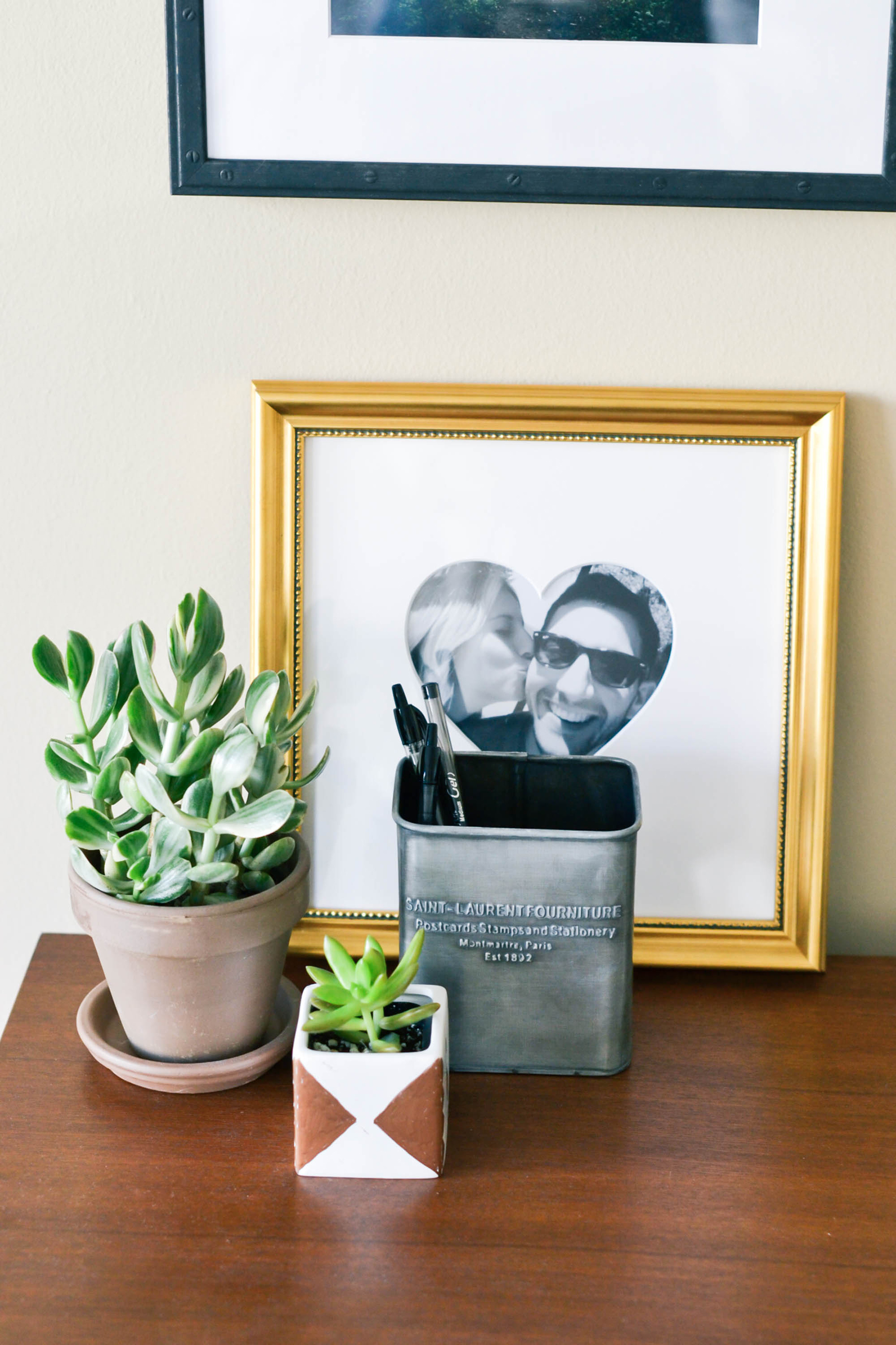 framebridge gallery wall, stylish frames, custom frames, decorating guys apartment, masculine decor, masculine apartment decor, succulents, photography by Amanda Holstein for Advicefroma20Something.com