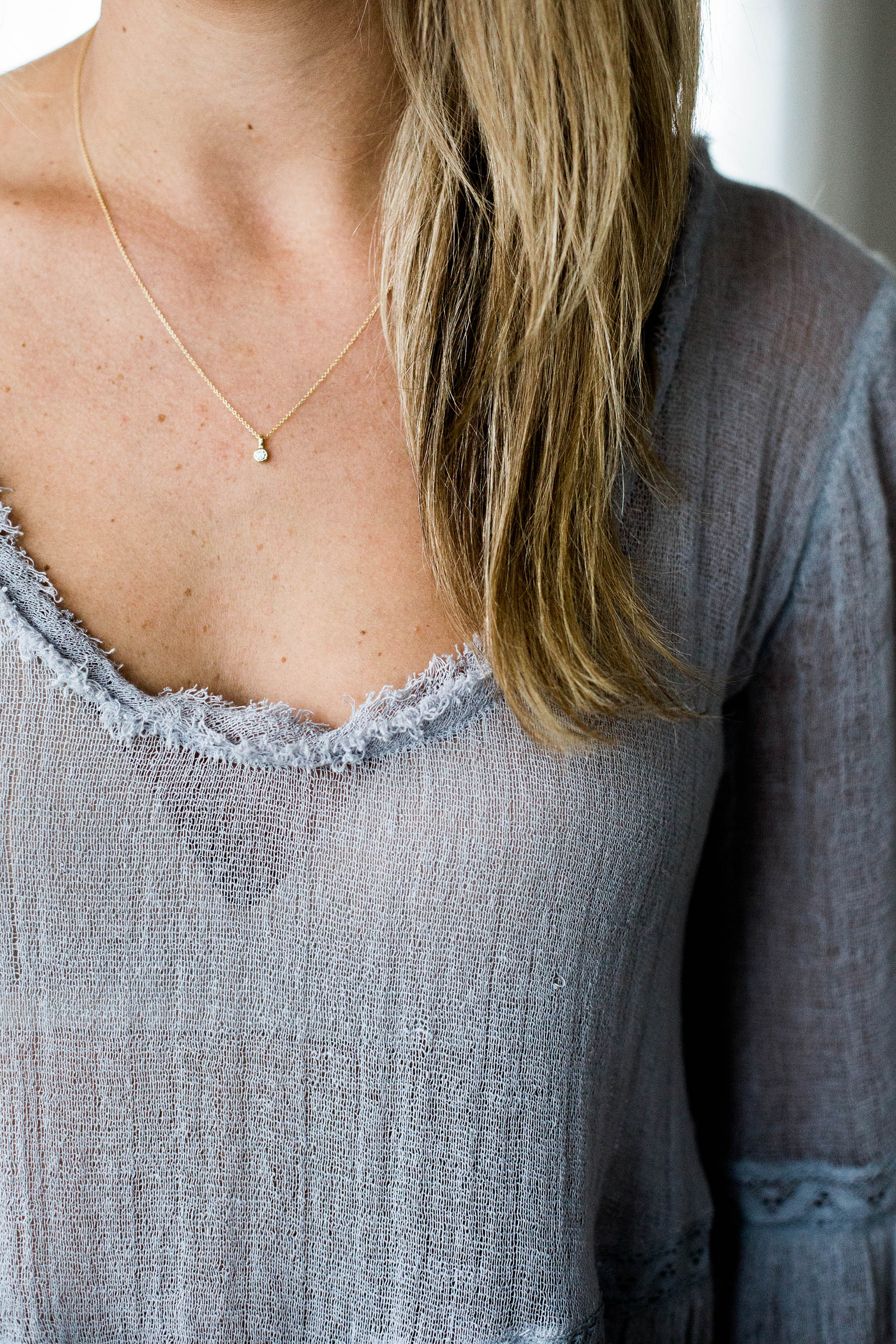 Amanda Holstein in diamond necklace from Diamond Foundry and Free People shirt