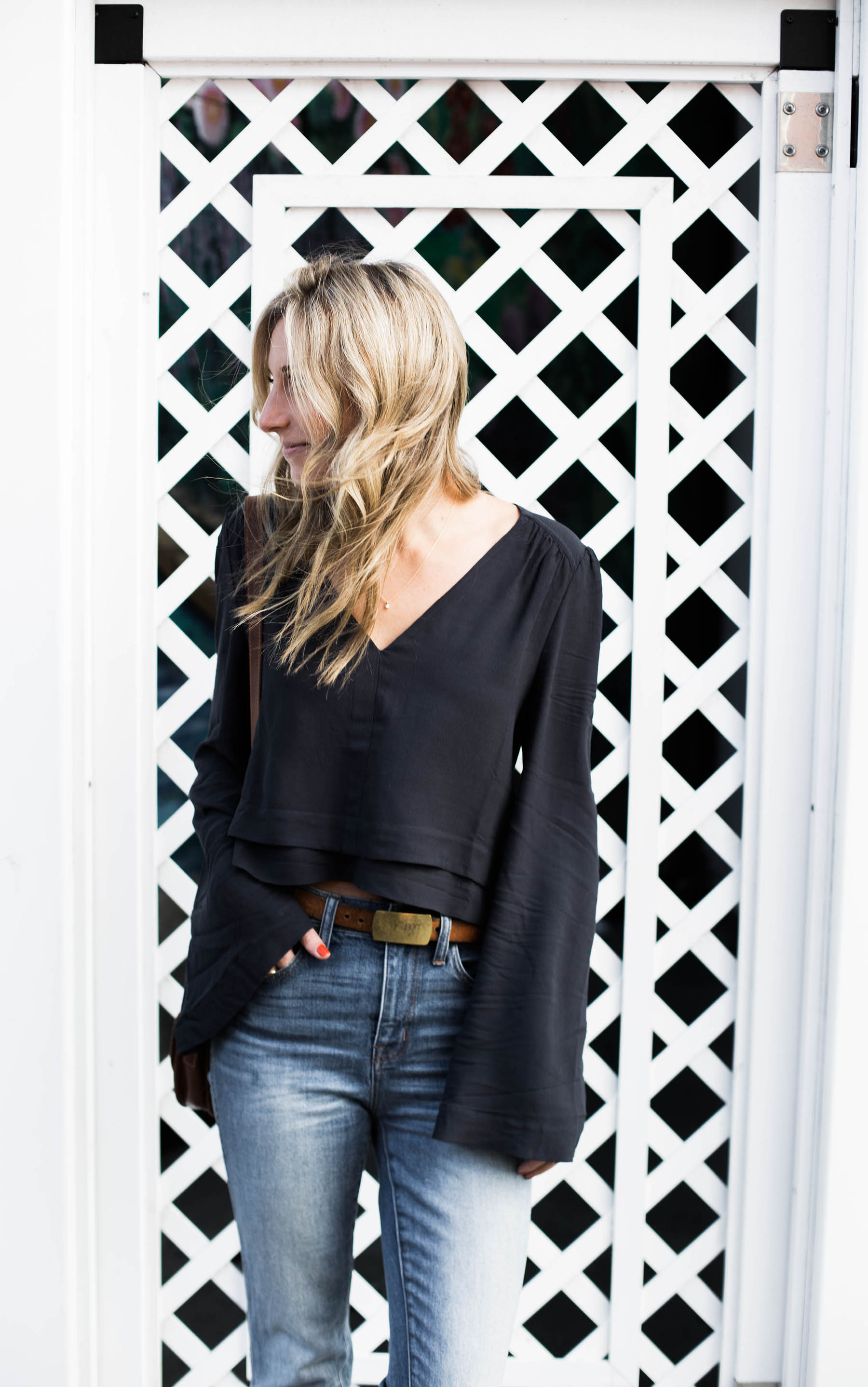 Amanda Holstein in bell sleeve top from Free People