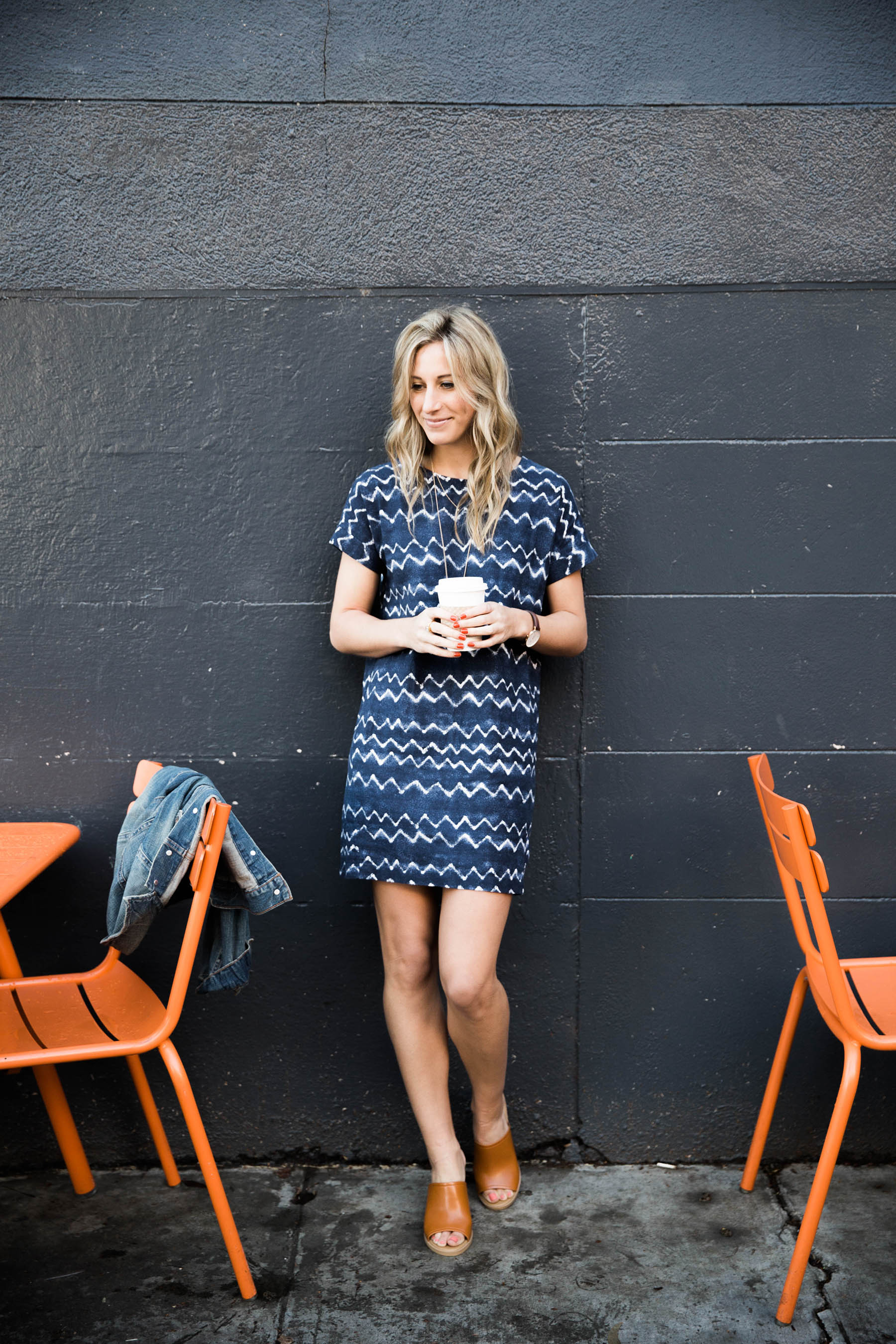 Amanda Holstein in Old Navy shibori print dress and mules for spring outfit