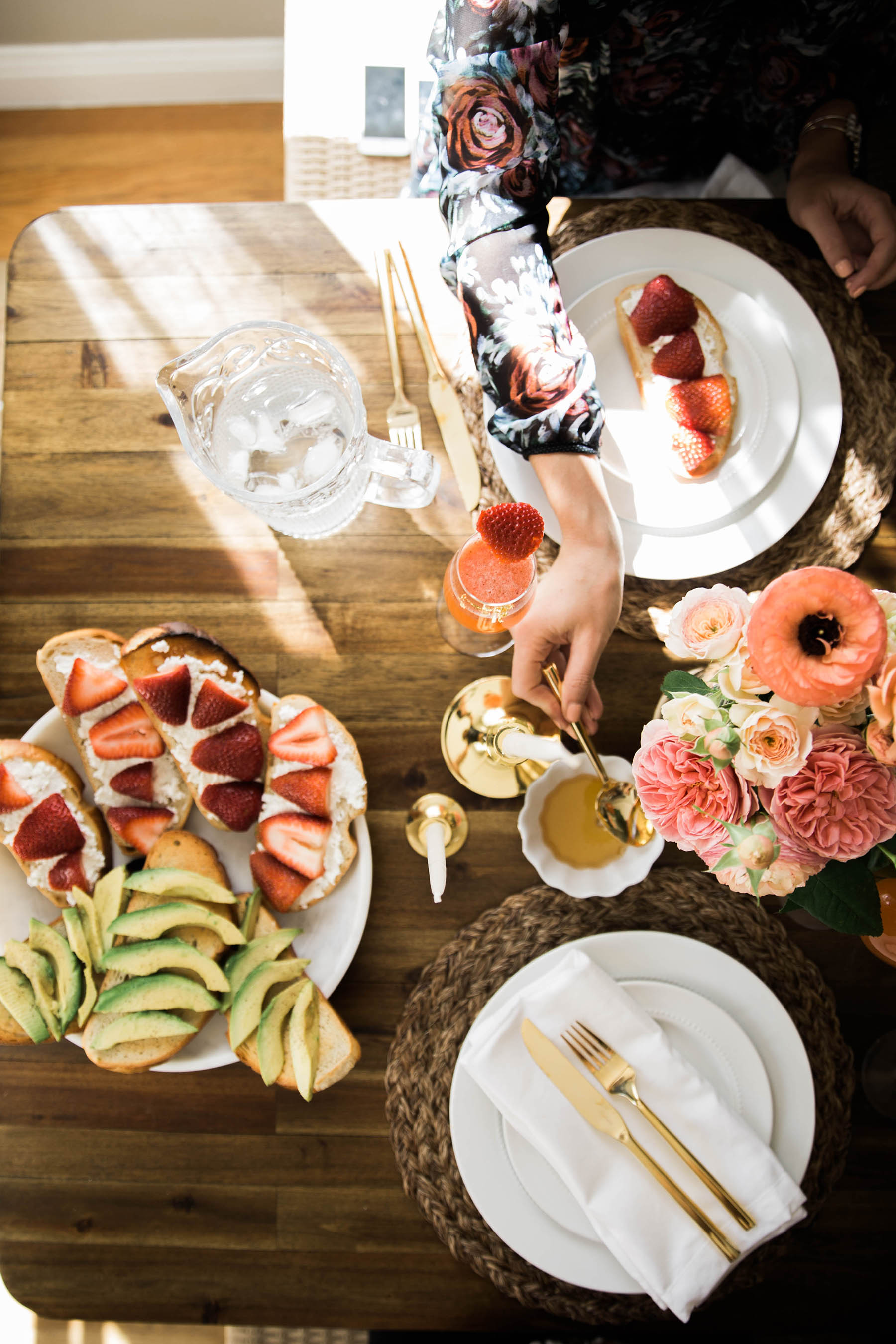 spring brunch setting with avocado toast and ricotta toast