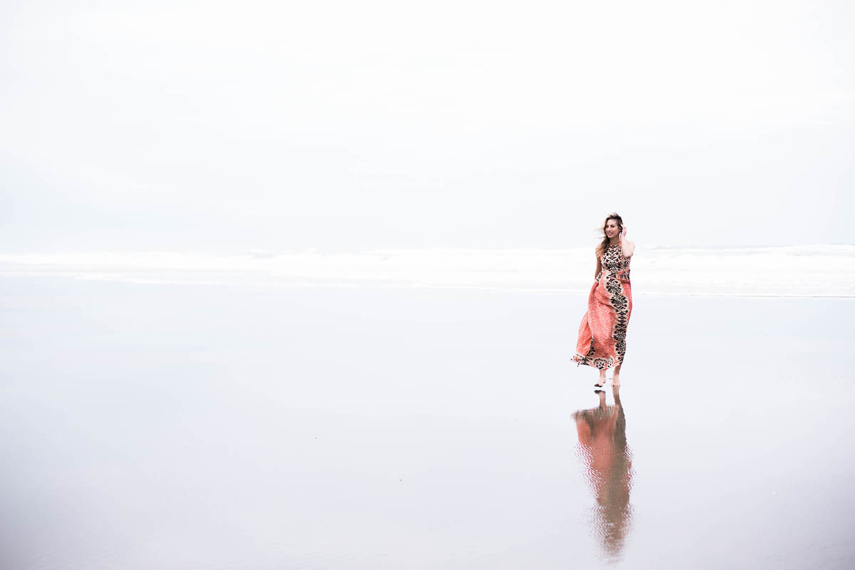 Amanda Holstein on the beach in Anthropologie Botanique Maxi Dress for beach formal wedding