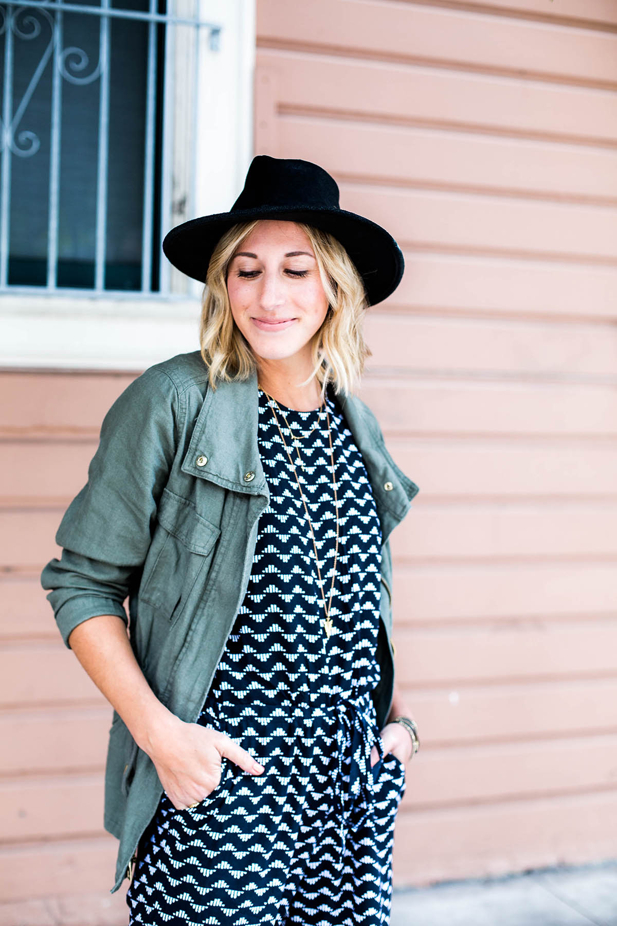Amanda Holstein in Old Navy printed jumpsuit outfit and utility jacket