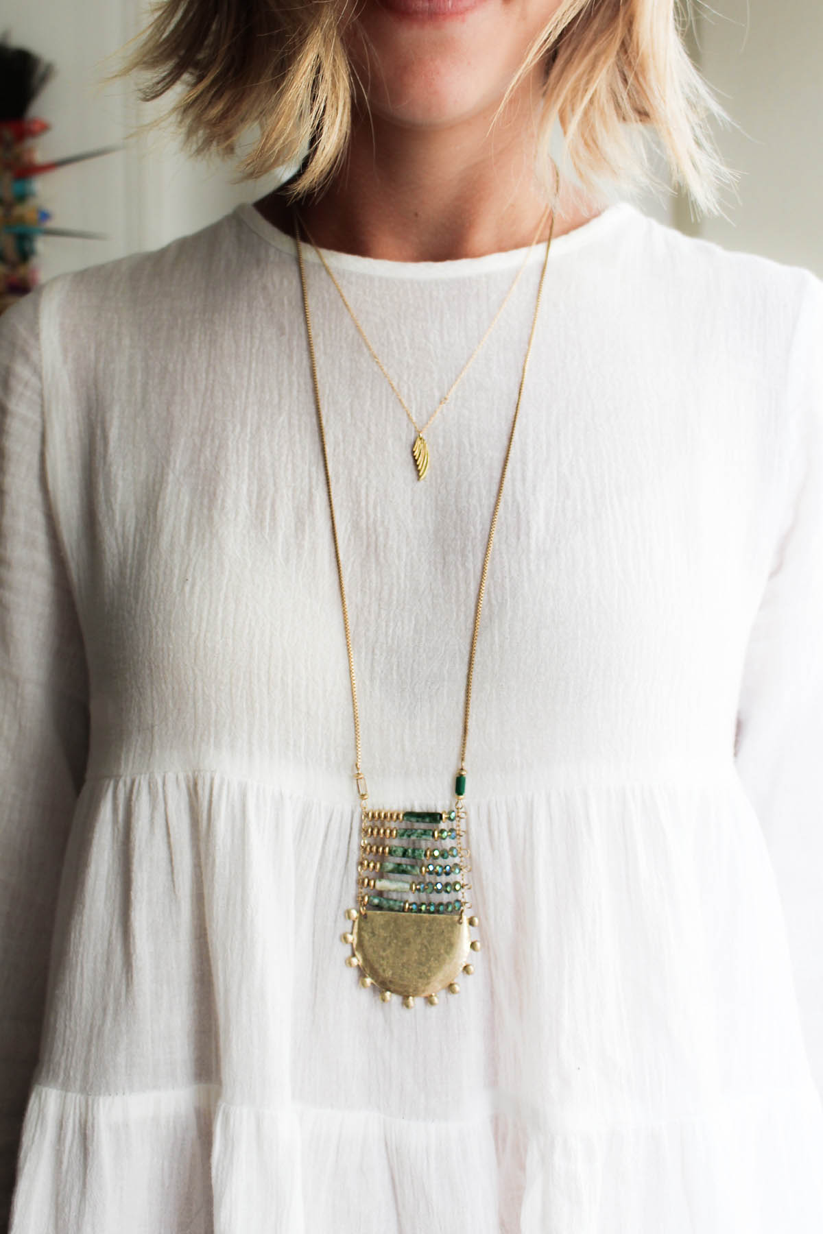 how to layer necklaces with a bohemian style