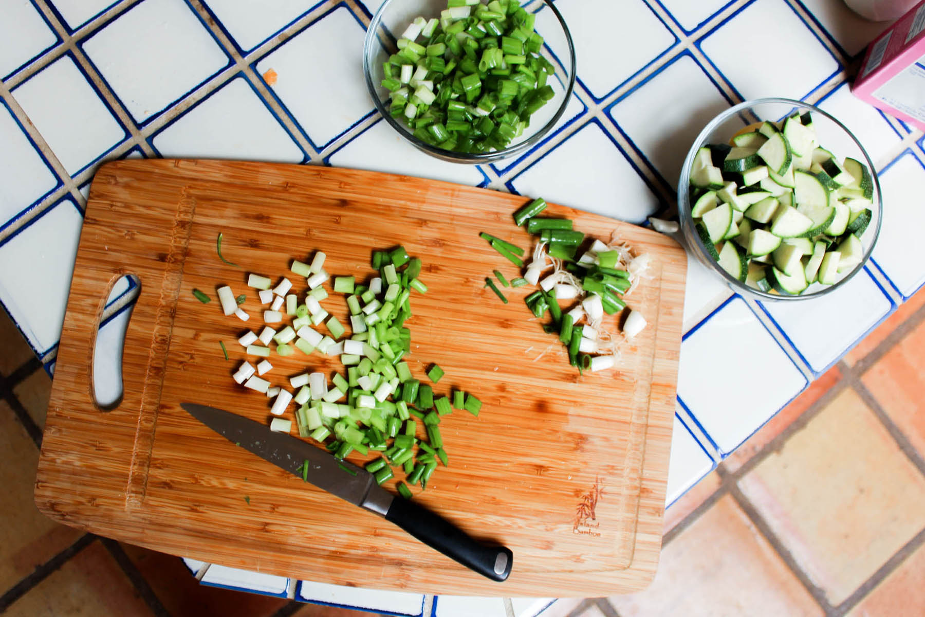 chopping vegetables in the kitchen