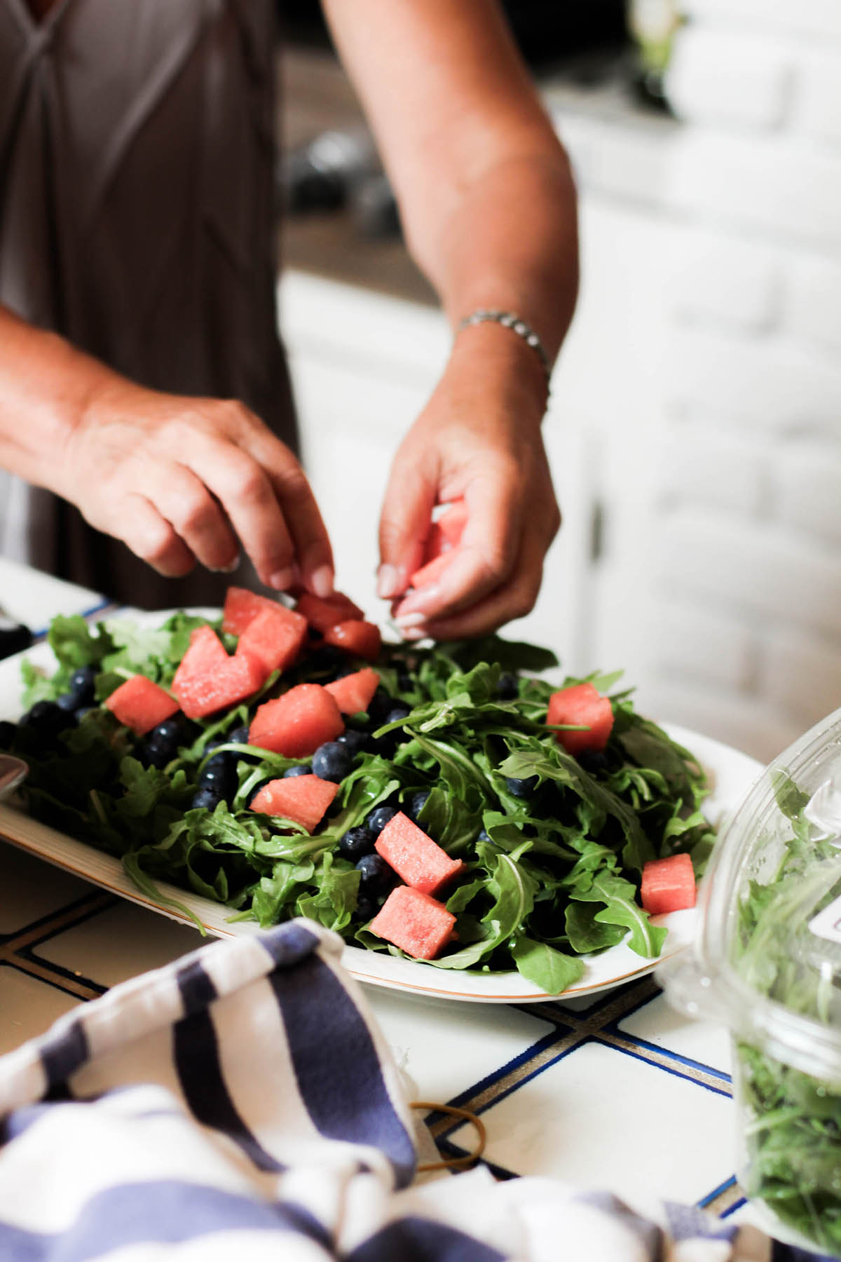 arugula salad with watermelon, blueberries, and feta cheese