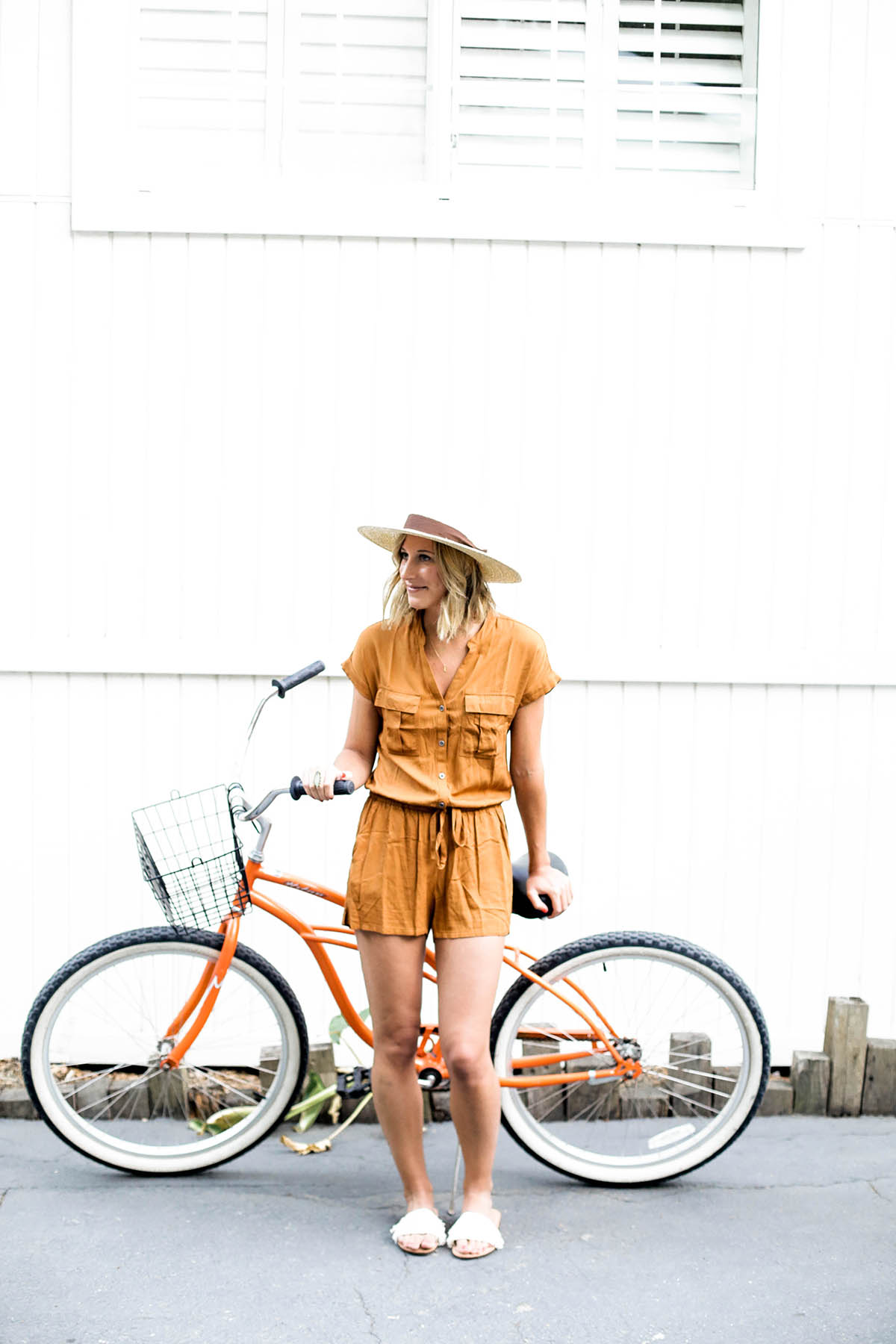 Amanda Holstein in Old Navy romper and woven fedora hat