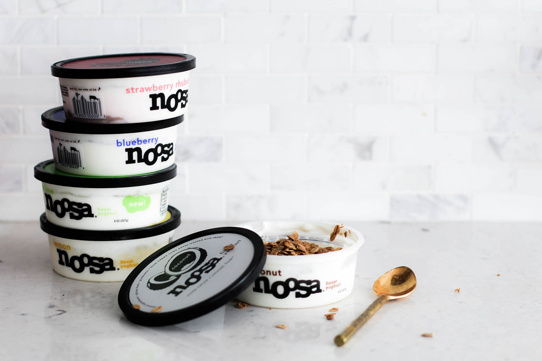 noosa yoghurt on white marble kitchen counter