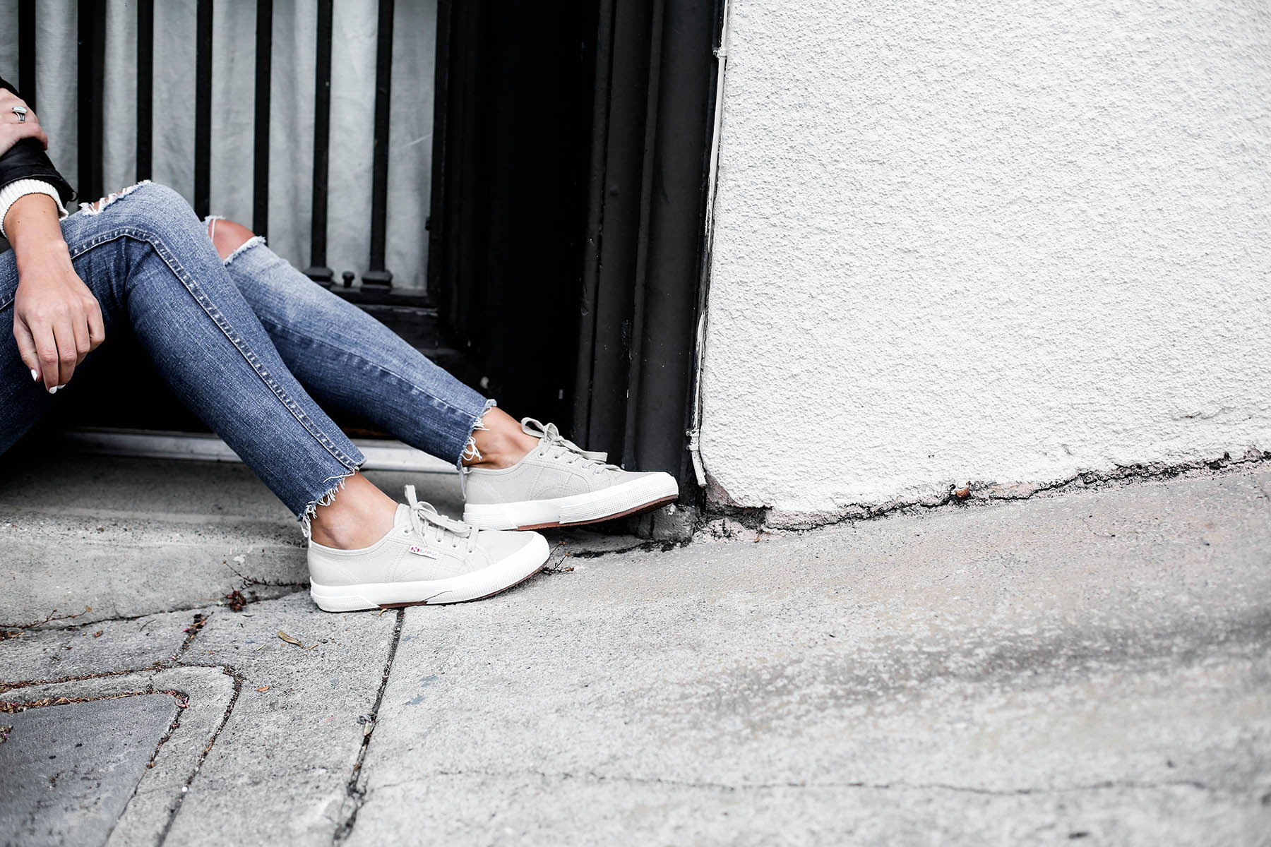 madewell distressed skinny jeans and superga sneakers in taupe