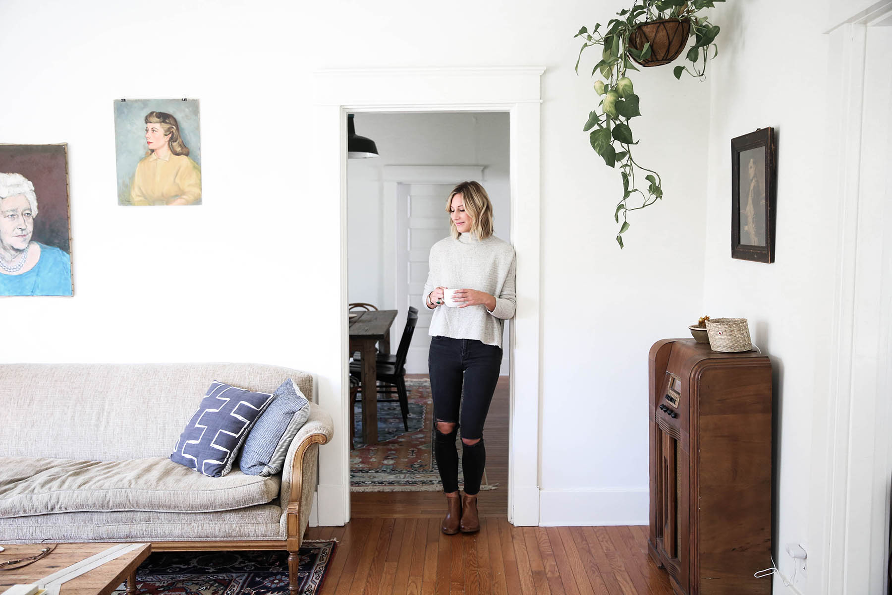 free people arctic fox sweater with chelsea boots and black distressed skinny jeans