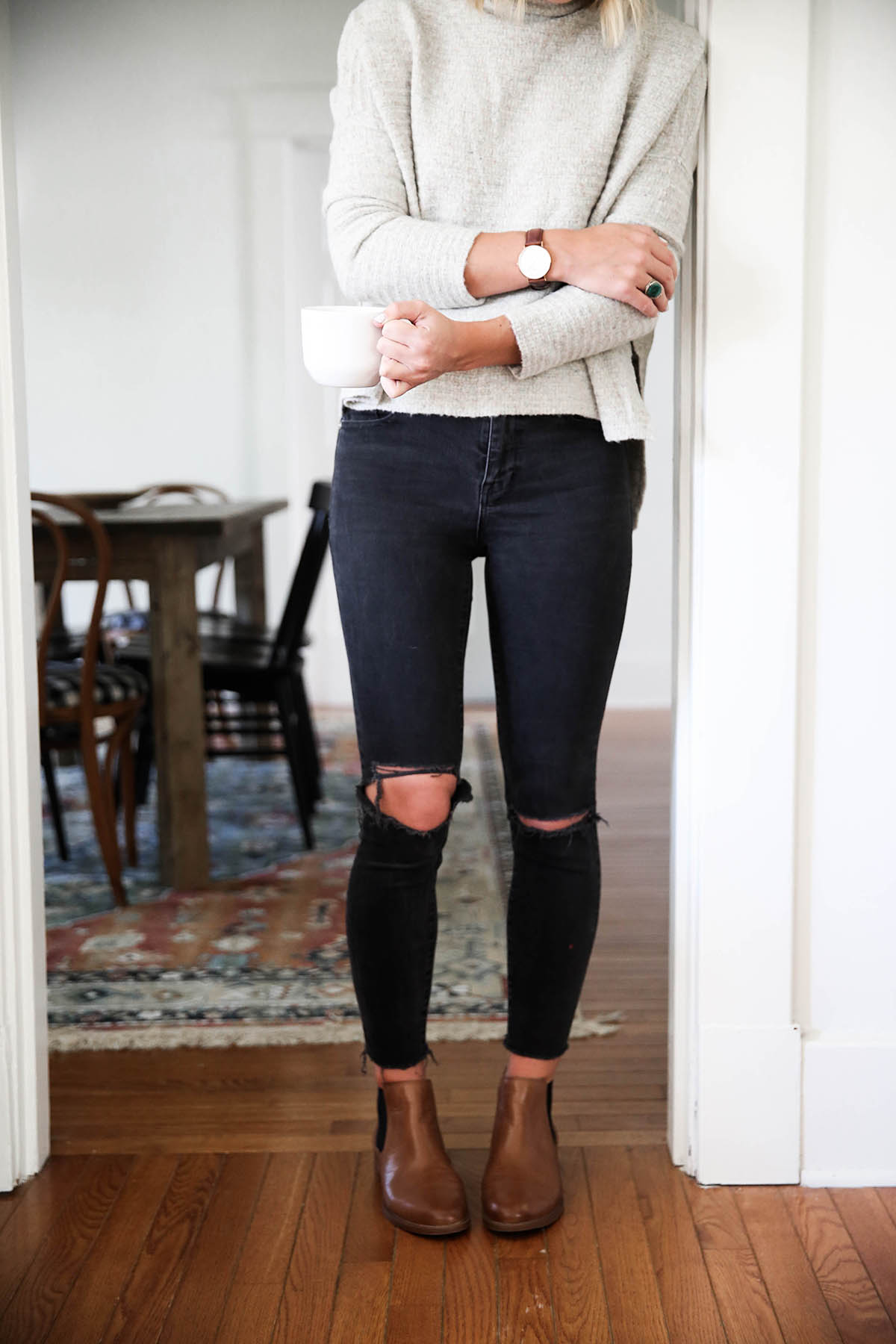 free people arctic fox sweater with chelsea boots and black distressed skinny jeans