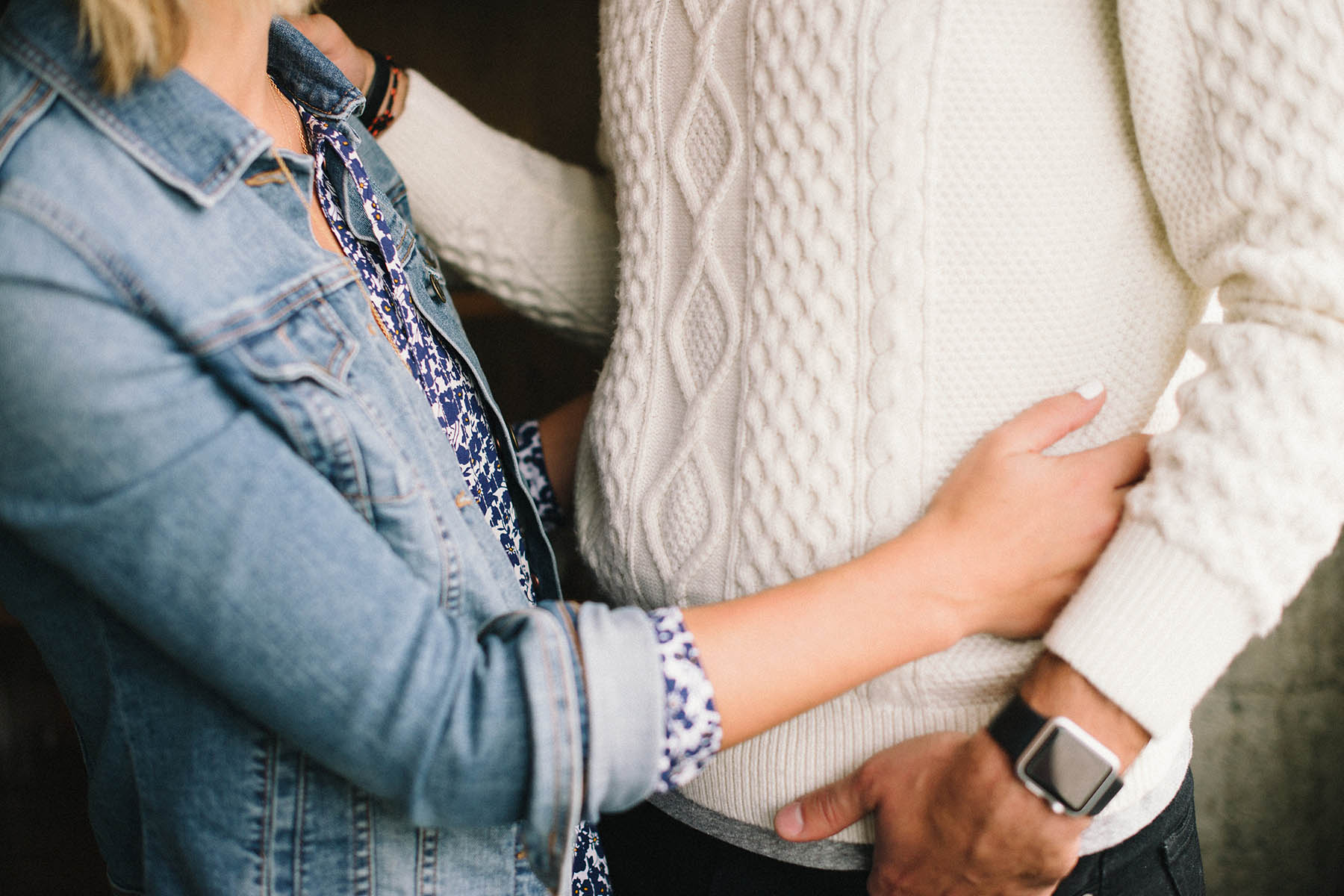 couple in old navy denim jacket and gap cable knit sweater 