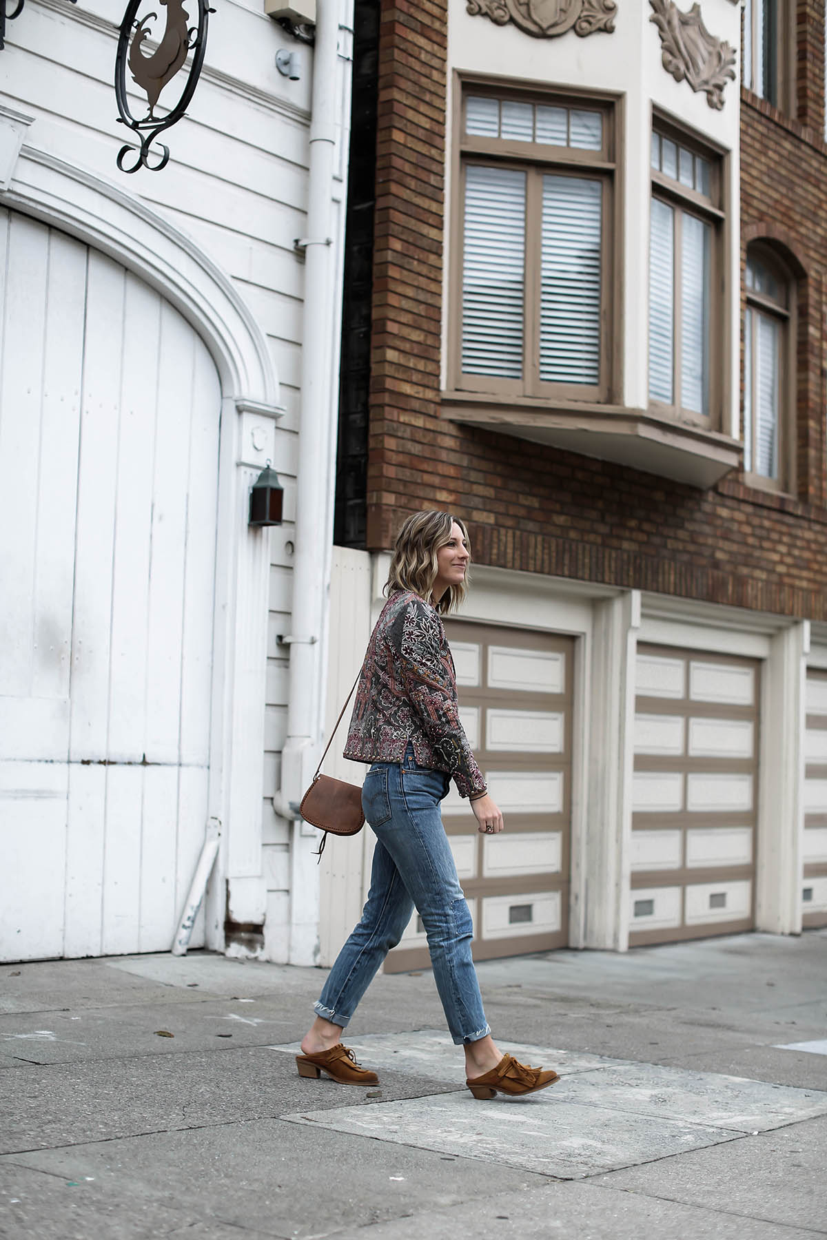 anthropologie statement jacket and jeans outfit