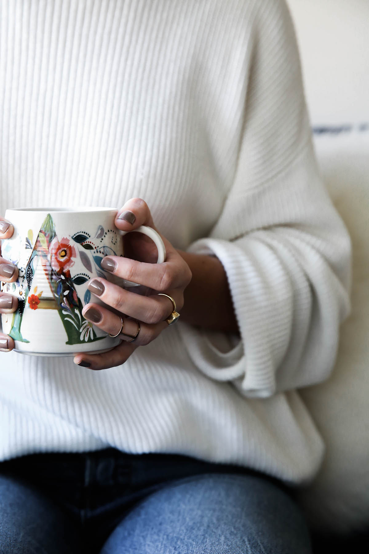 dark nude nails and anthropologie mug