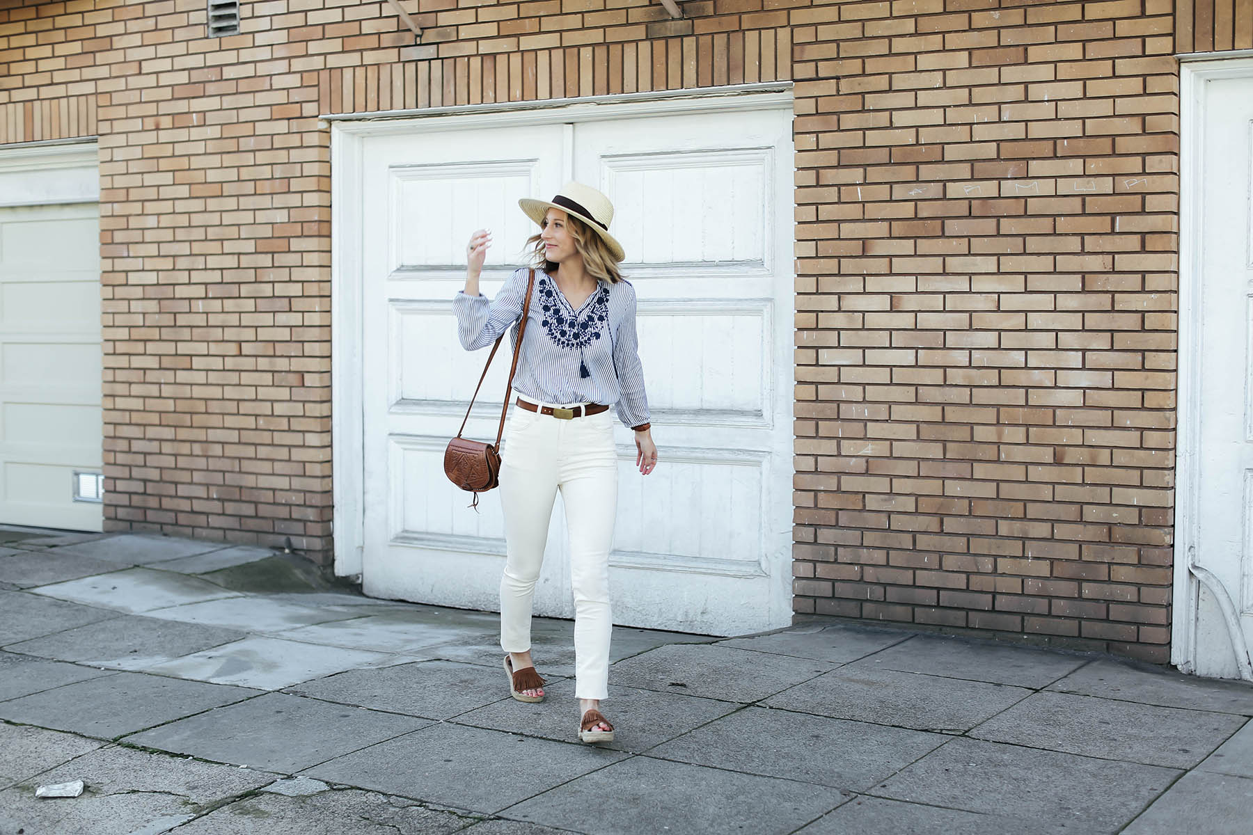 old navy embroidered nautical trend shirt with white high rise jeans and brixton hat