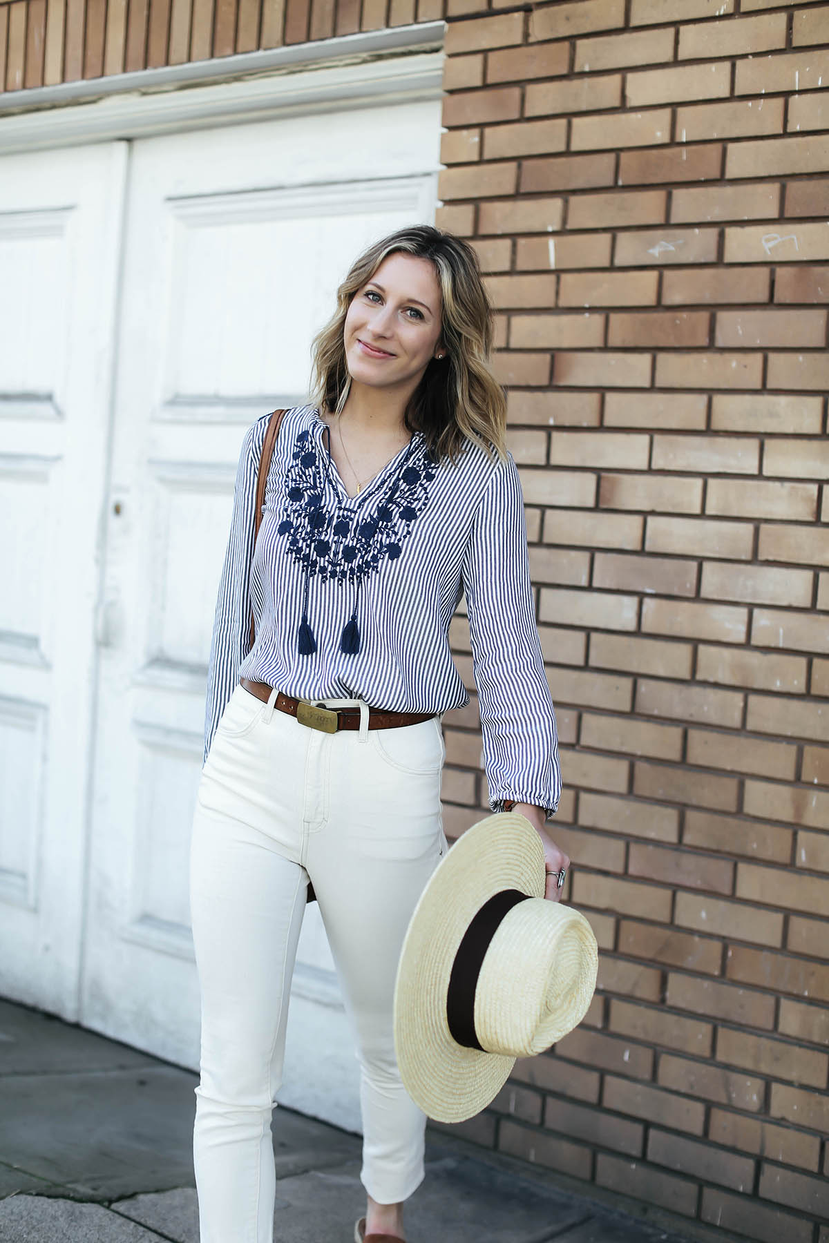 old navy embroidered nautical trend shirt and white high rise jeans and brixton hat