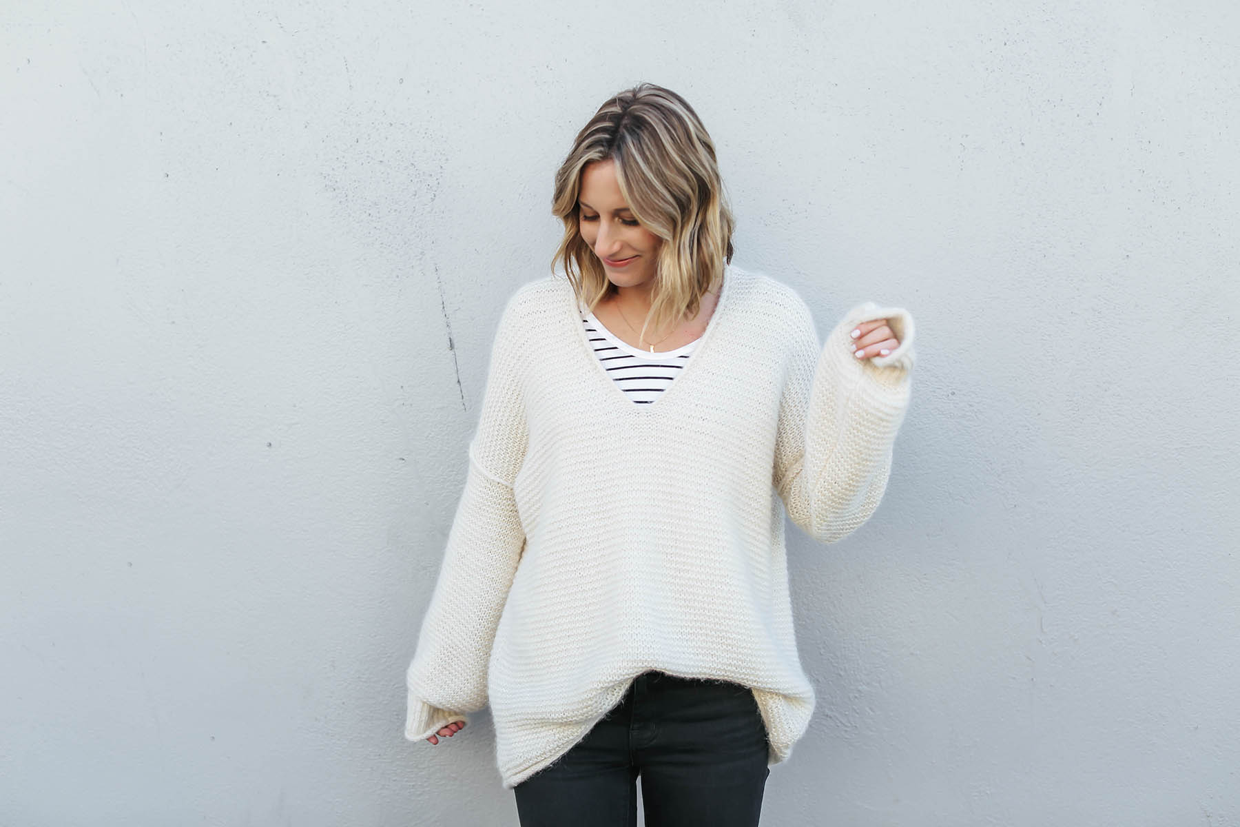 layered outfits with free people oversized all mine sweater