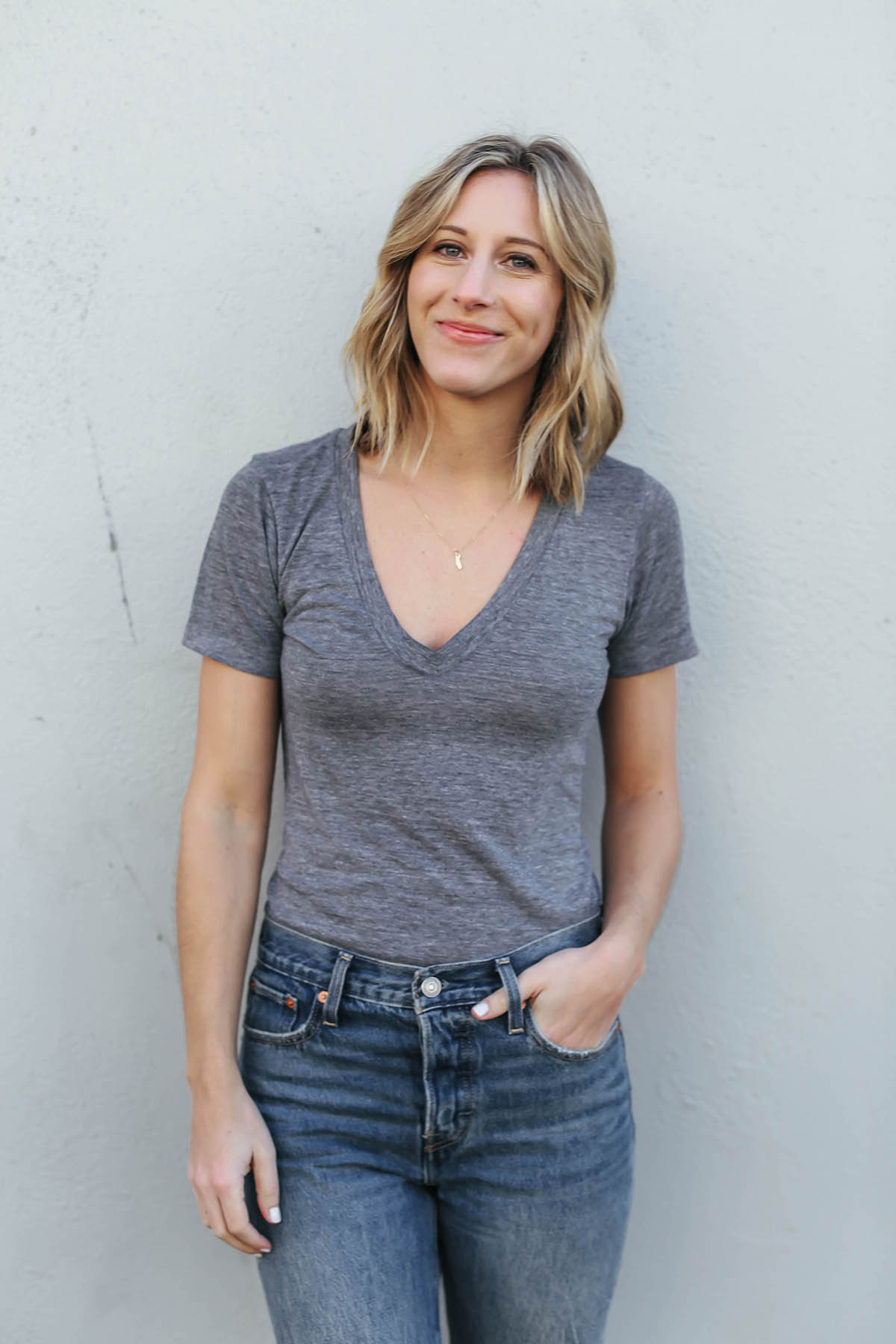 gray t-shirt and jeans