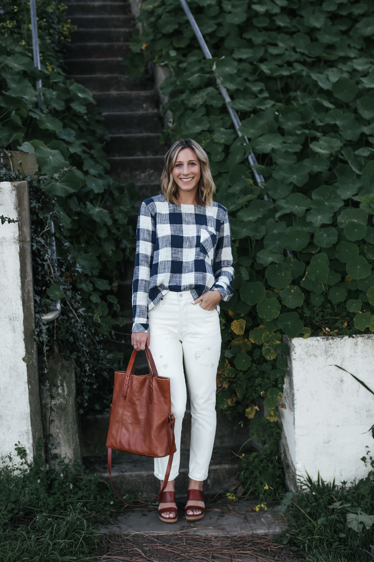 white embroidered denim and gingham top outfit from Anthropologie