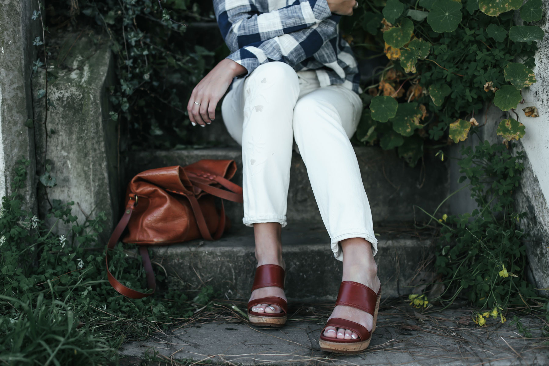 white embroidered denim and gingham top outfit from Anthropologie