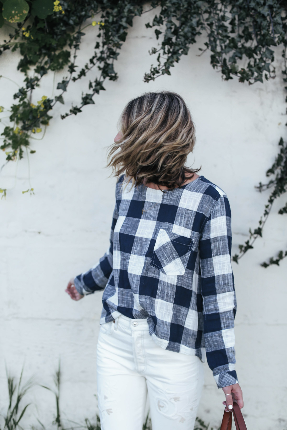 white embroidered denim and gingham top outfit from Anthropologie