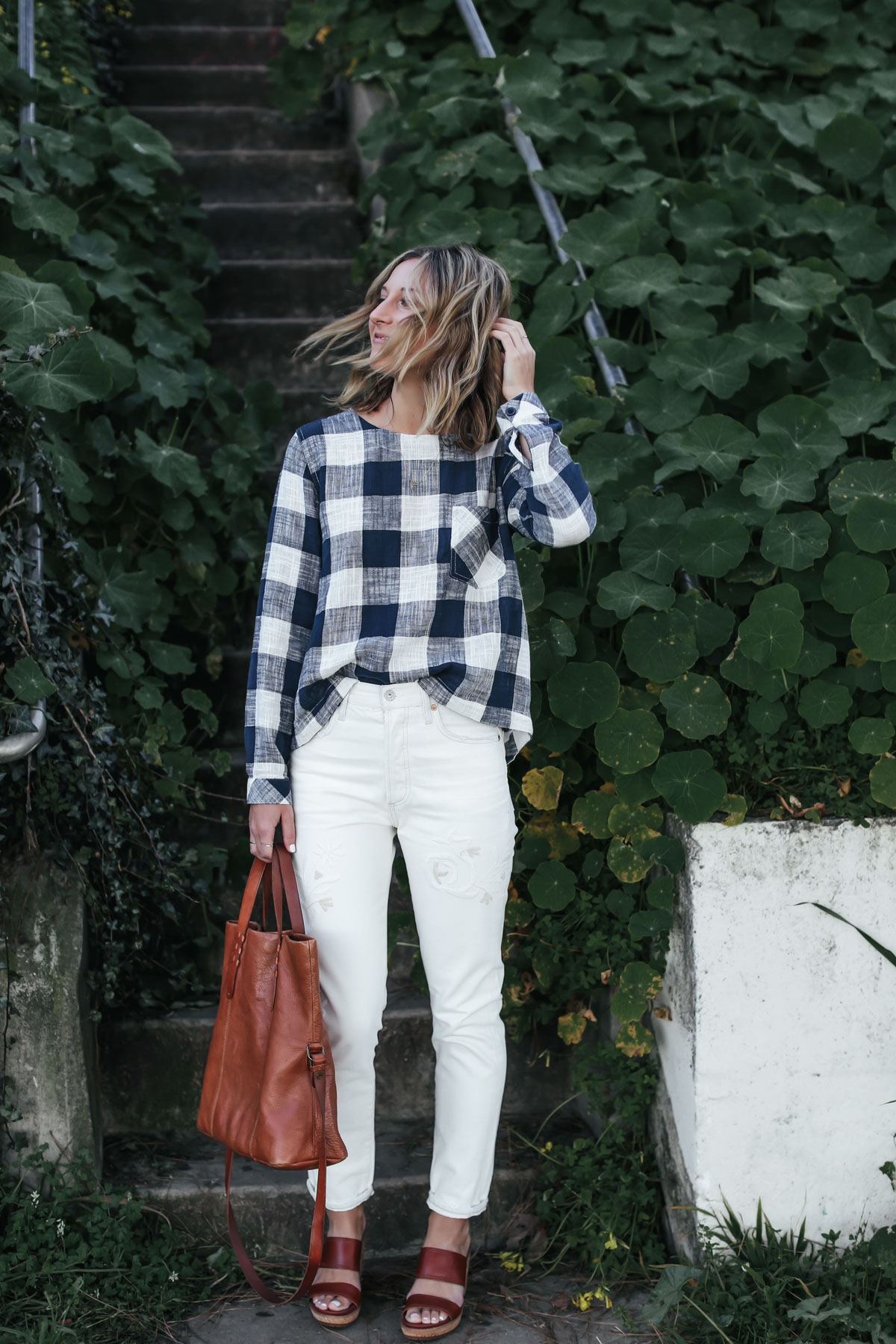 white embroidered denim and gingham top outfit from Anthropologie