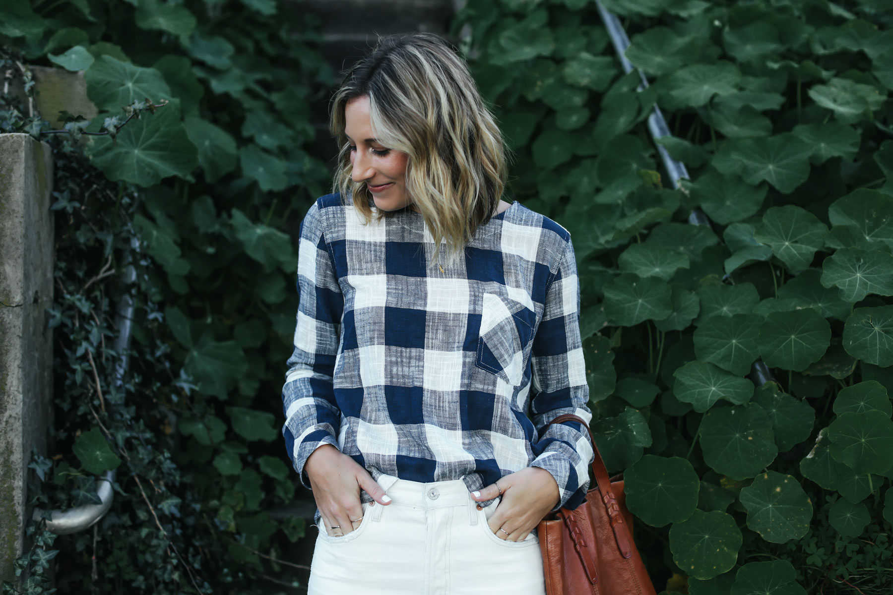 white embroidered denim and gingham top outfit from Anthropologie