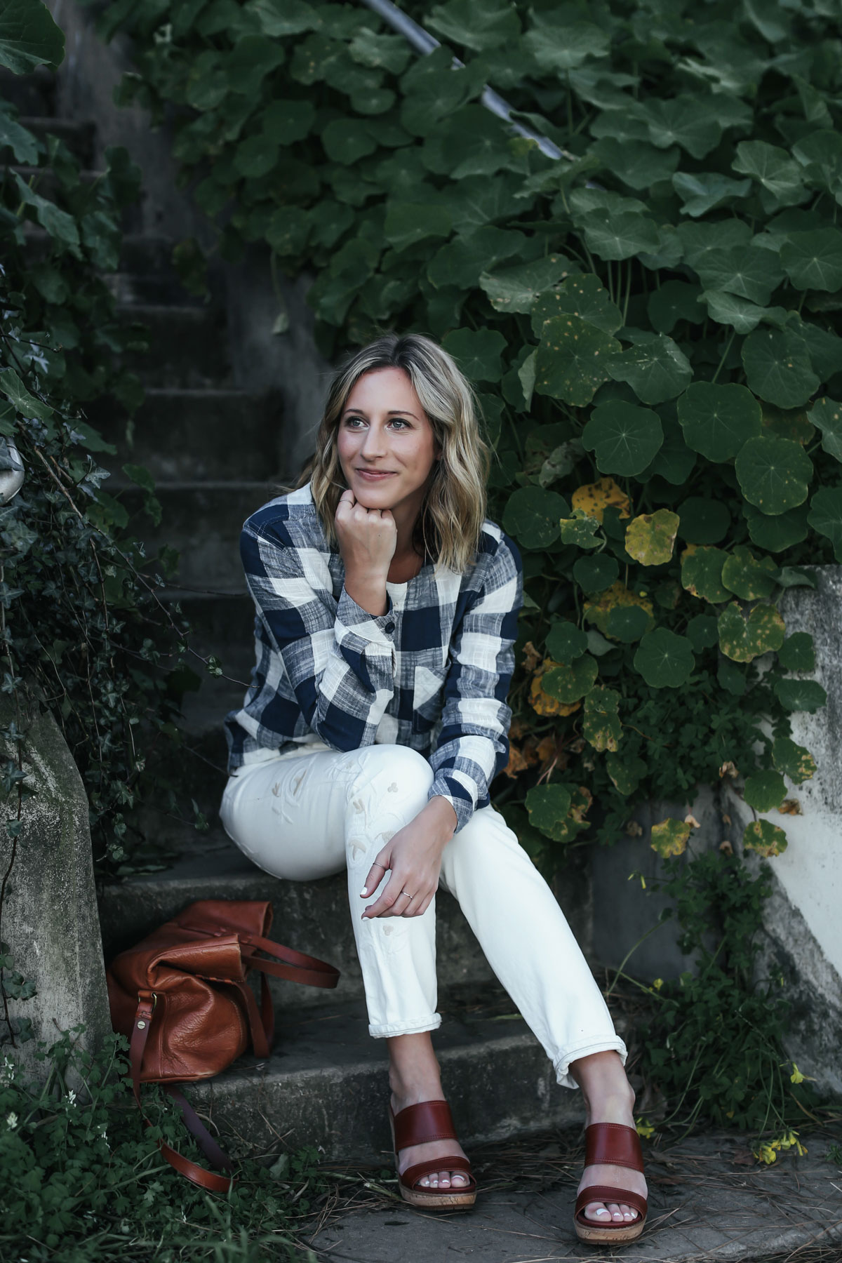 white embroidered denim and gingham top outfit from Anthropologie