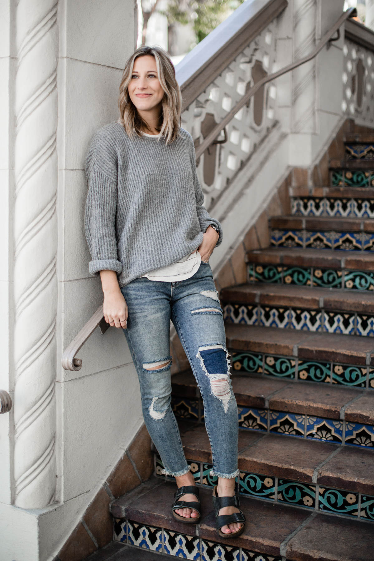 basic outfits with distressed denim and birkenstock sandals
