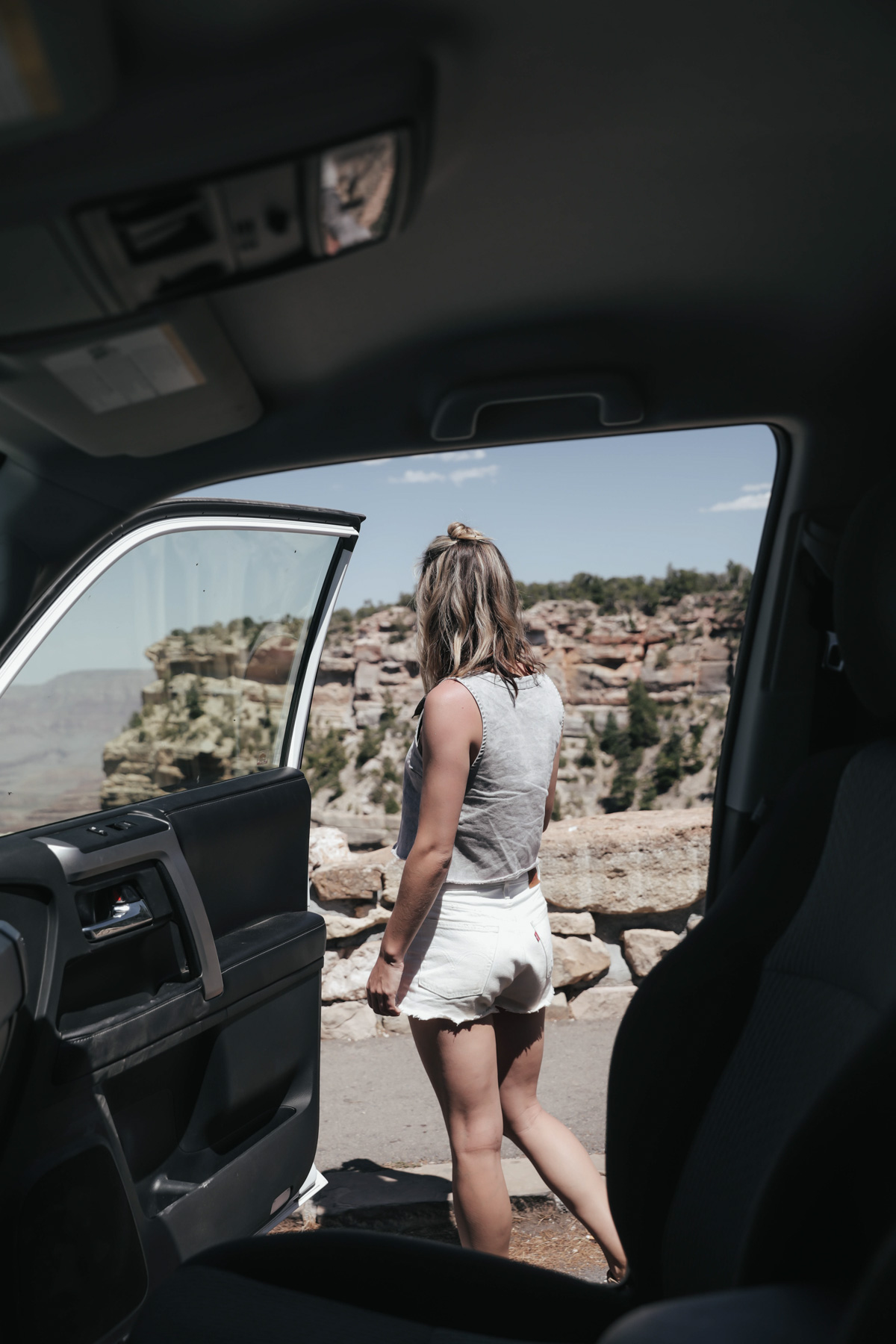 southwest road trip hiking Grand Canyon South Rim in Urban Outfitters denim top and cutoff shorts