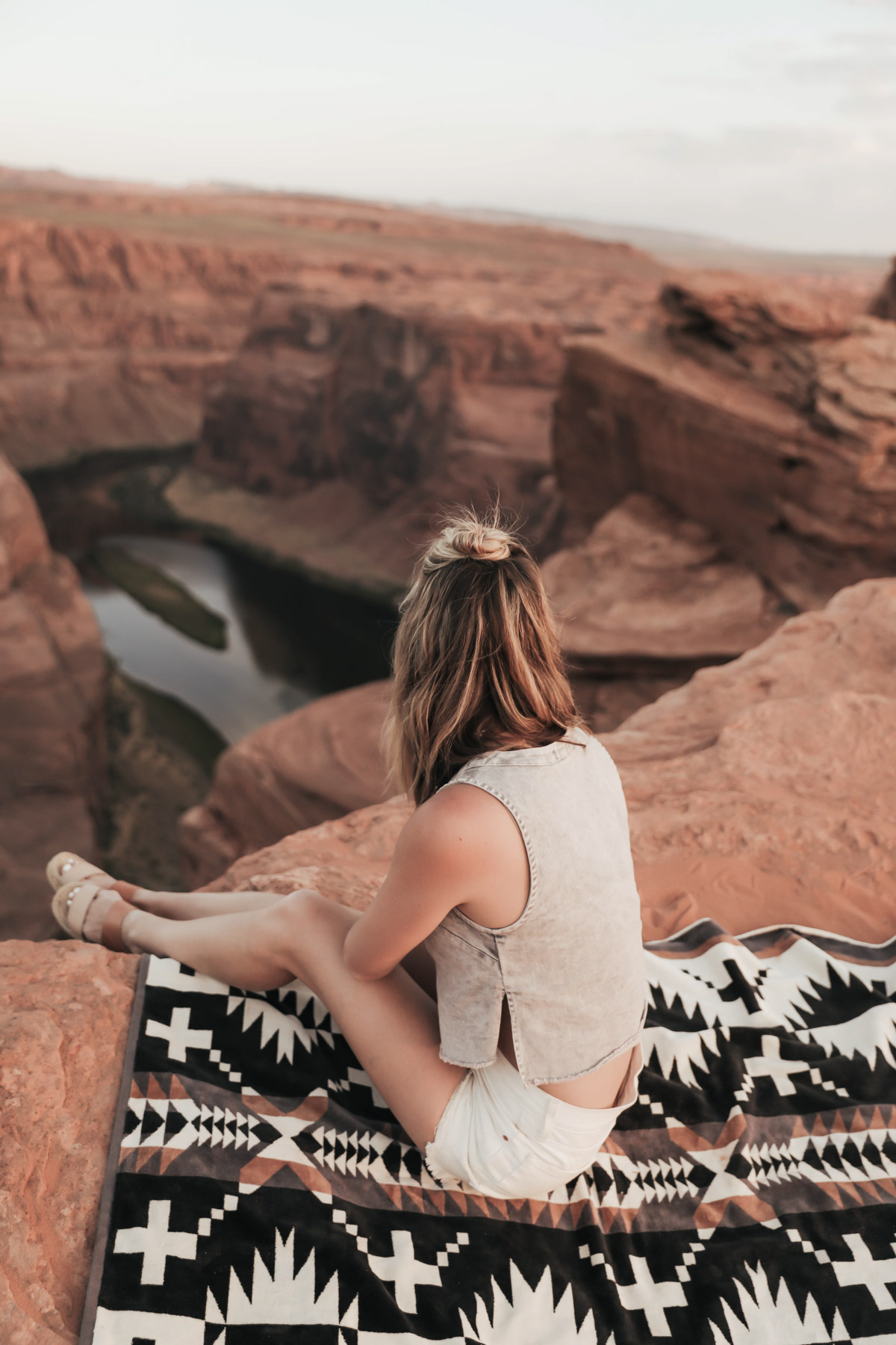 southwest road trip at Horseshoe Bend, Page, Arizona in Urban Outfitters denim