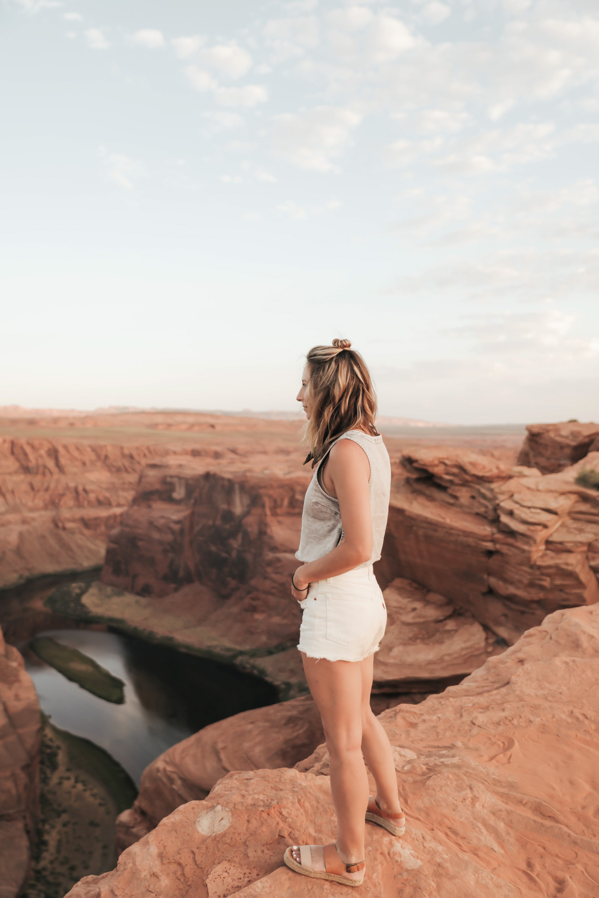 southwest road trip at Horseshoe Bend, Page, Arizona in Urban Outfitters denim
