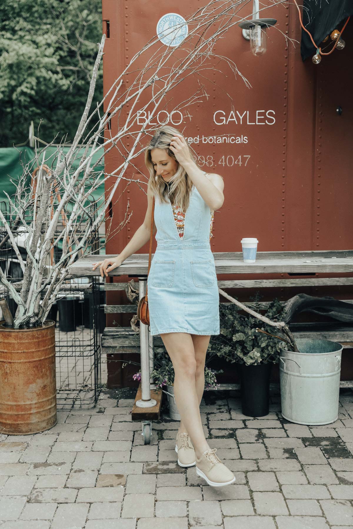 denim overalls jumper with floral top and ECCO leather sneakers for Advice from a 20 Something