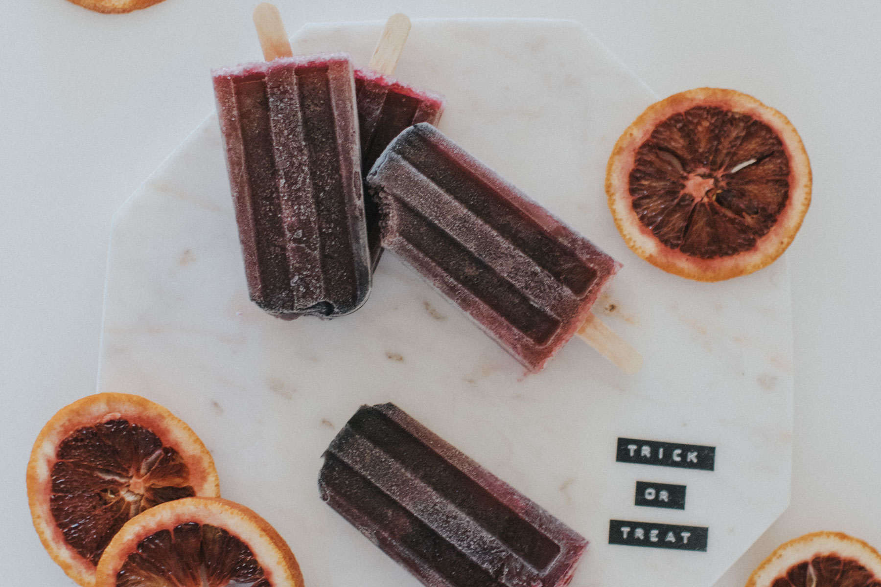 How to Make Boozy Black Popsicles for Halloween